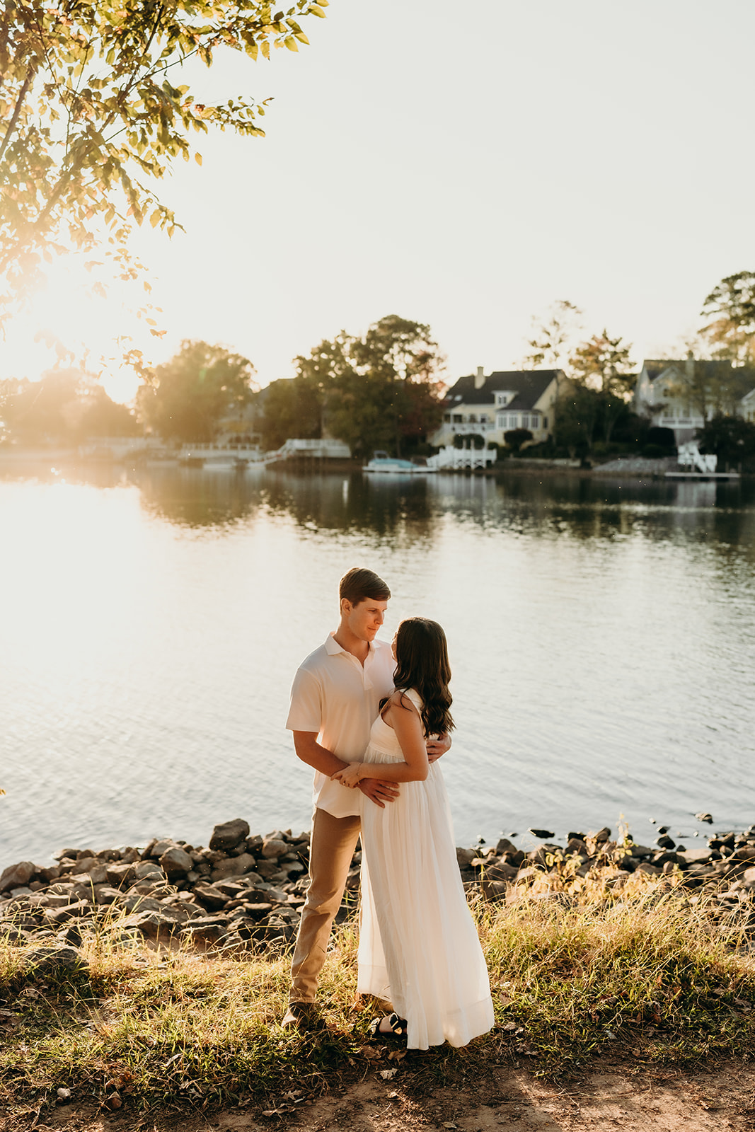 couple holding each other at golden hour