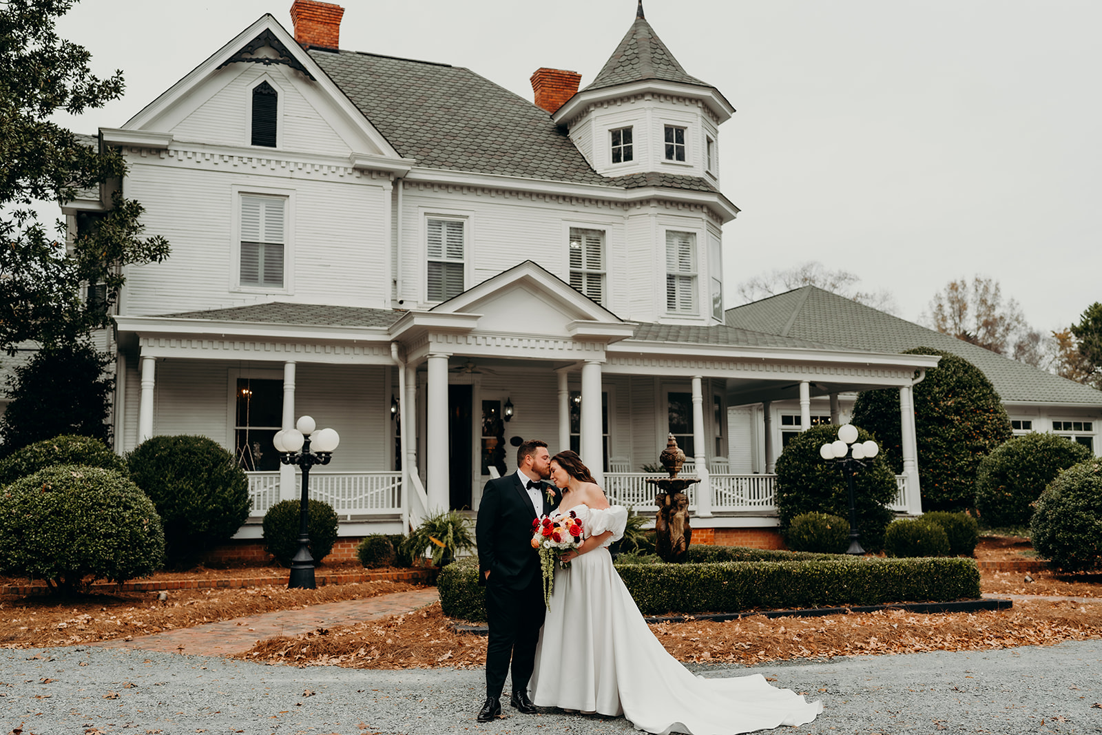 Couple outside of the grande victorian wedding venue