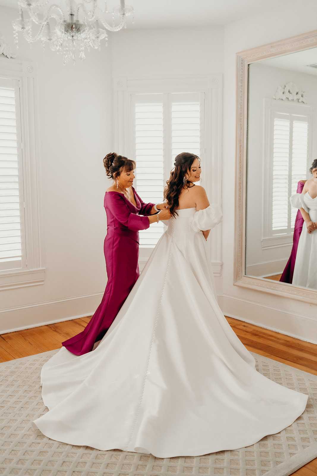 Bride getting ready in the bridal suite at the grande victorian