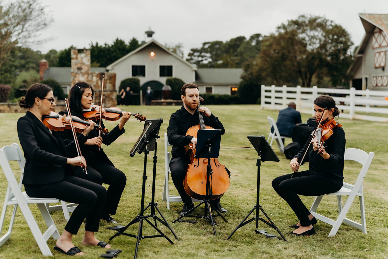 live musicians outside of the ceremony at The Historic Wakefield Barn