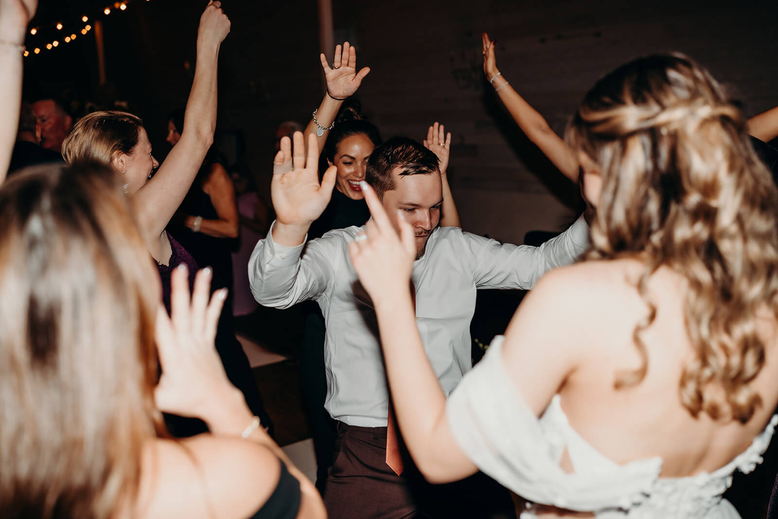 groom dancing on the dance floor