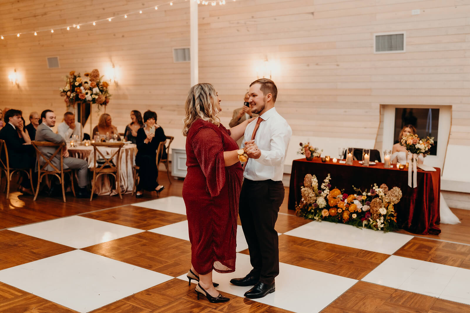 groom and mom sharing a first dance