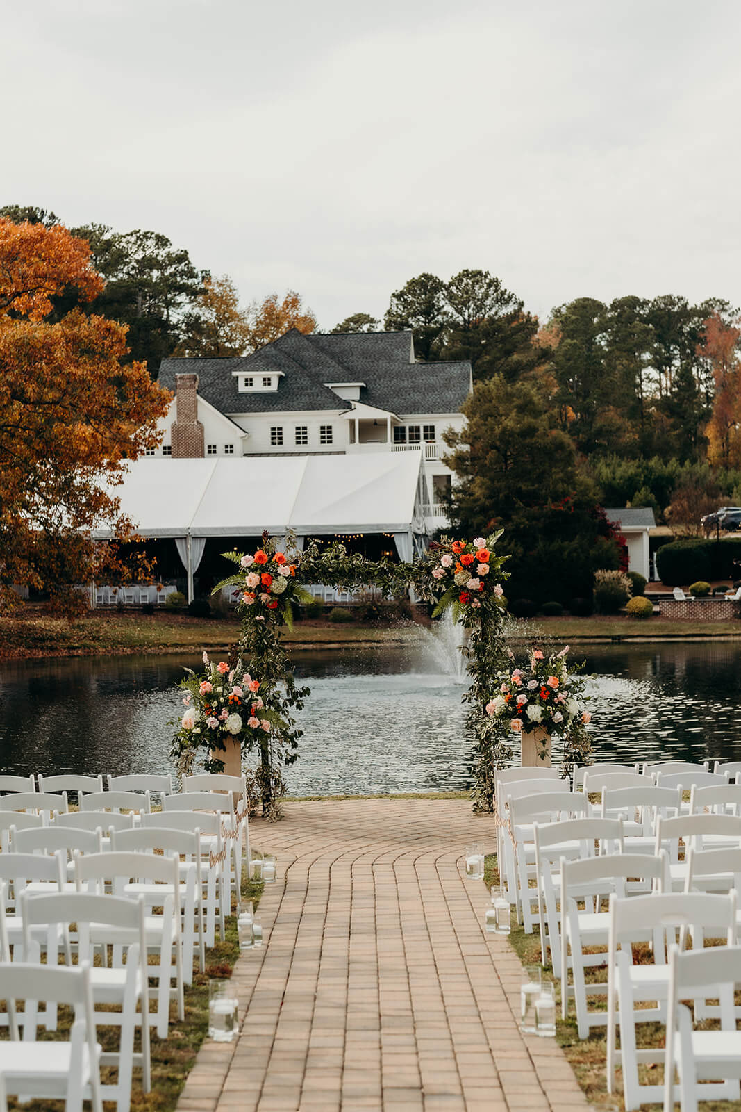 Ceremony set up in front of the pond at The Oaks at Salem