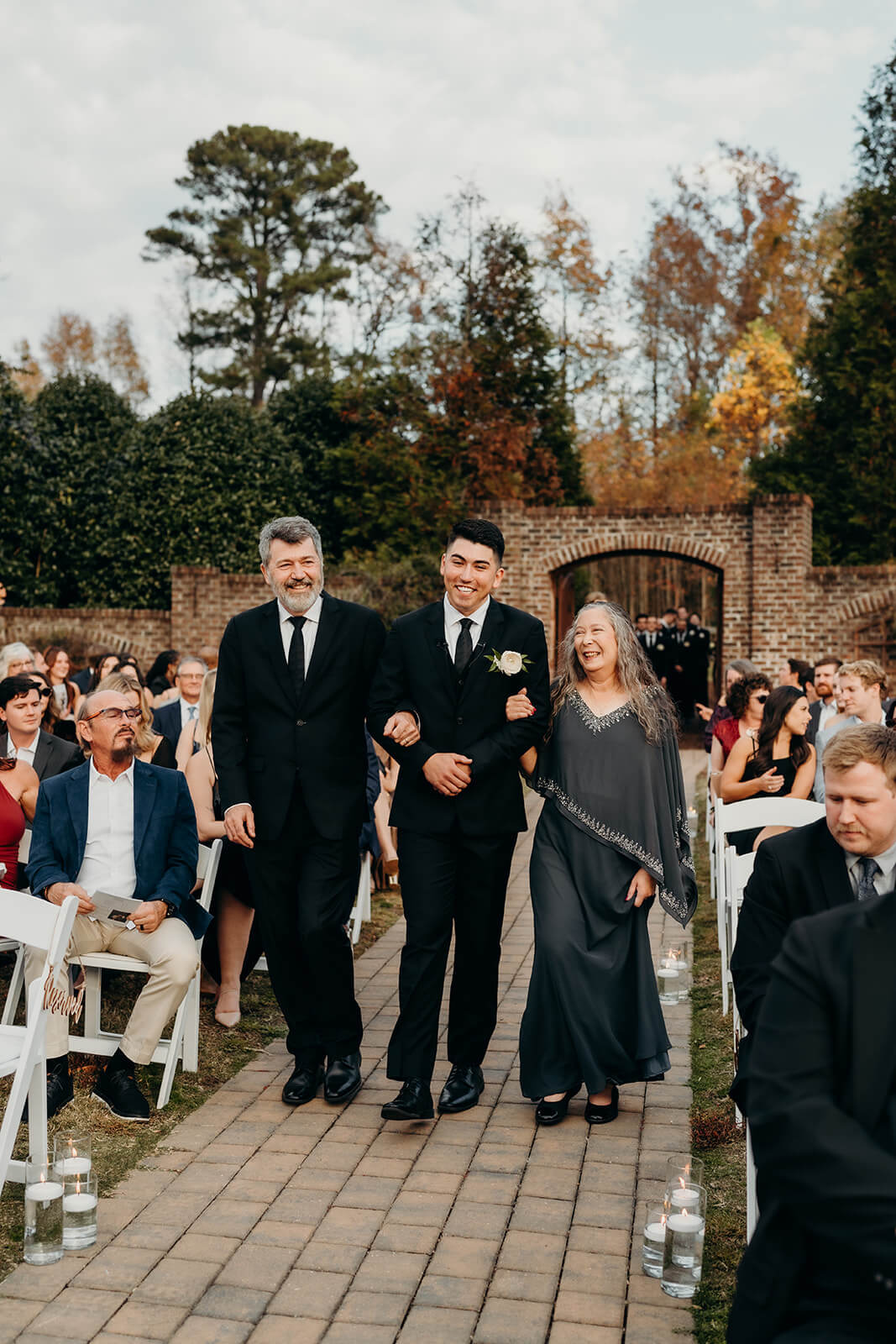 groom walking down the aisle The Oaks at Salem