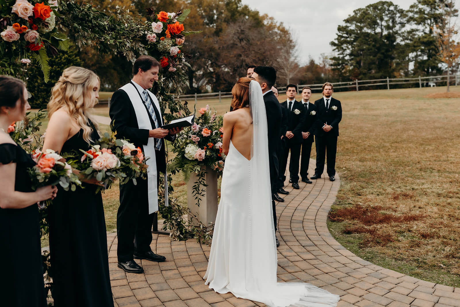 bride and groom standing at ceremony