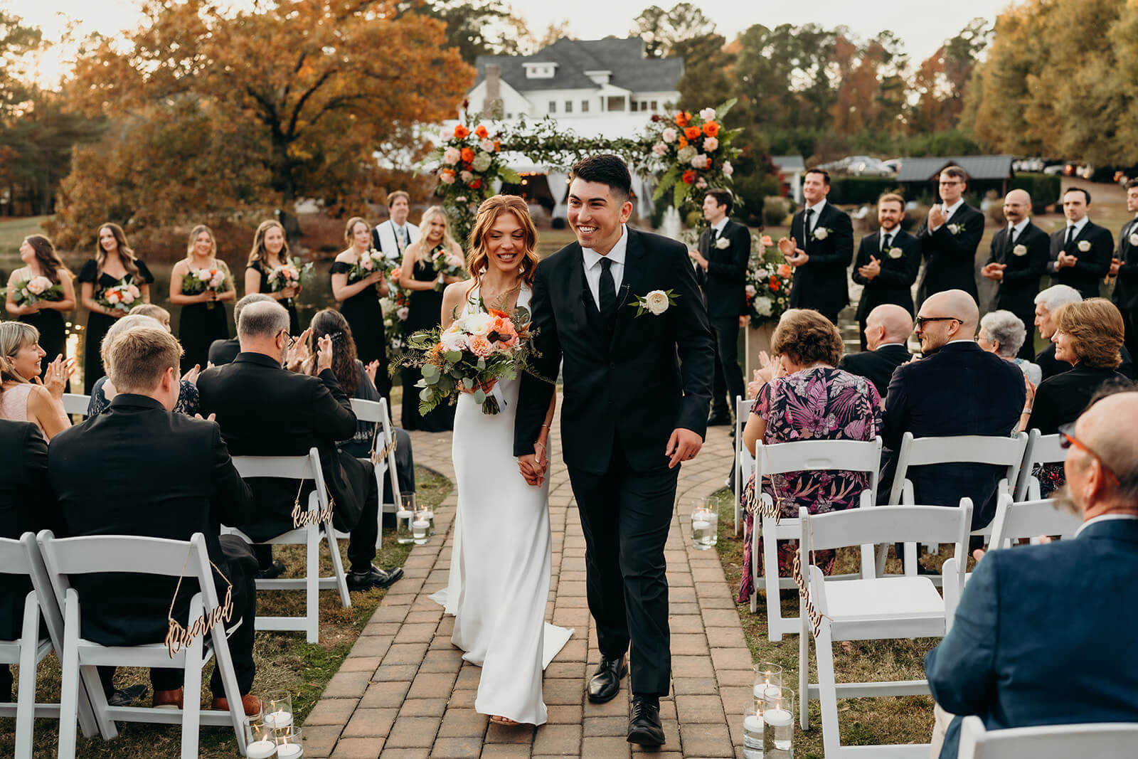 bride and groom walking down the aisle at The Oaks at Salem