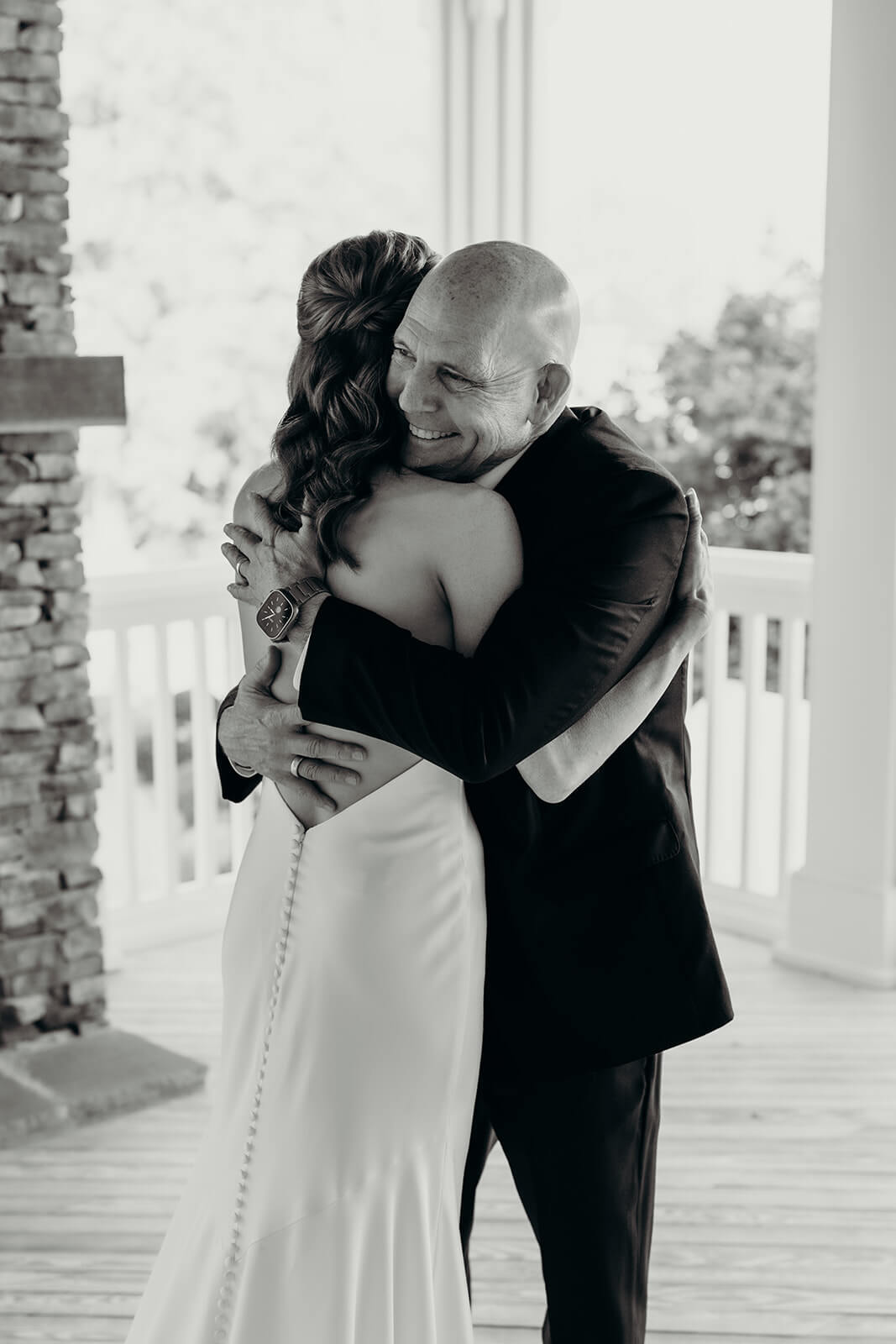 bride and dad first look moment on the porch at The Oaks at Salem