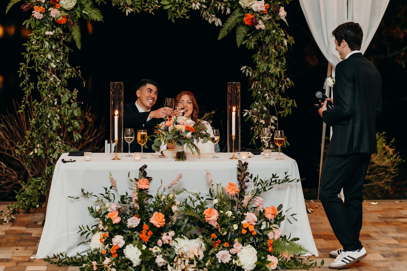 bride and groom toasts at The Oaks at Salem