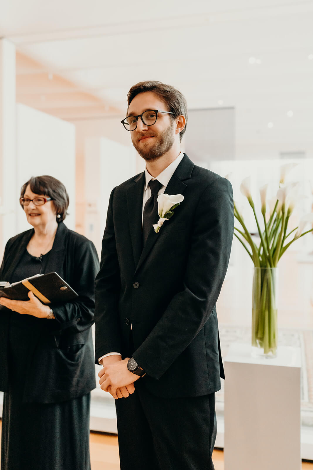 groom waiting for bride to walk down the aisle at NCMA wedding photos