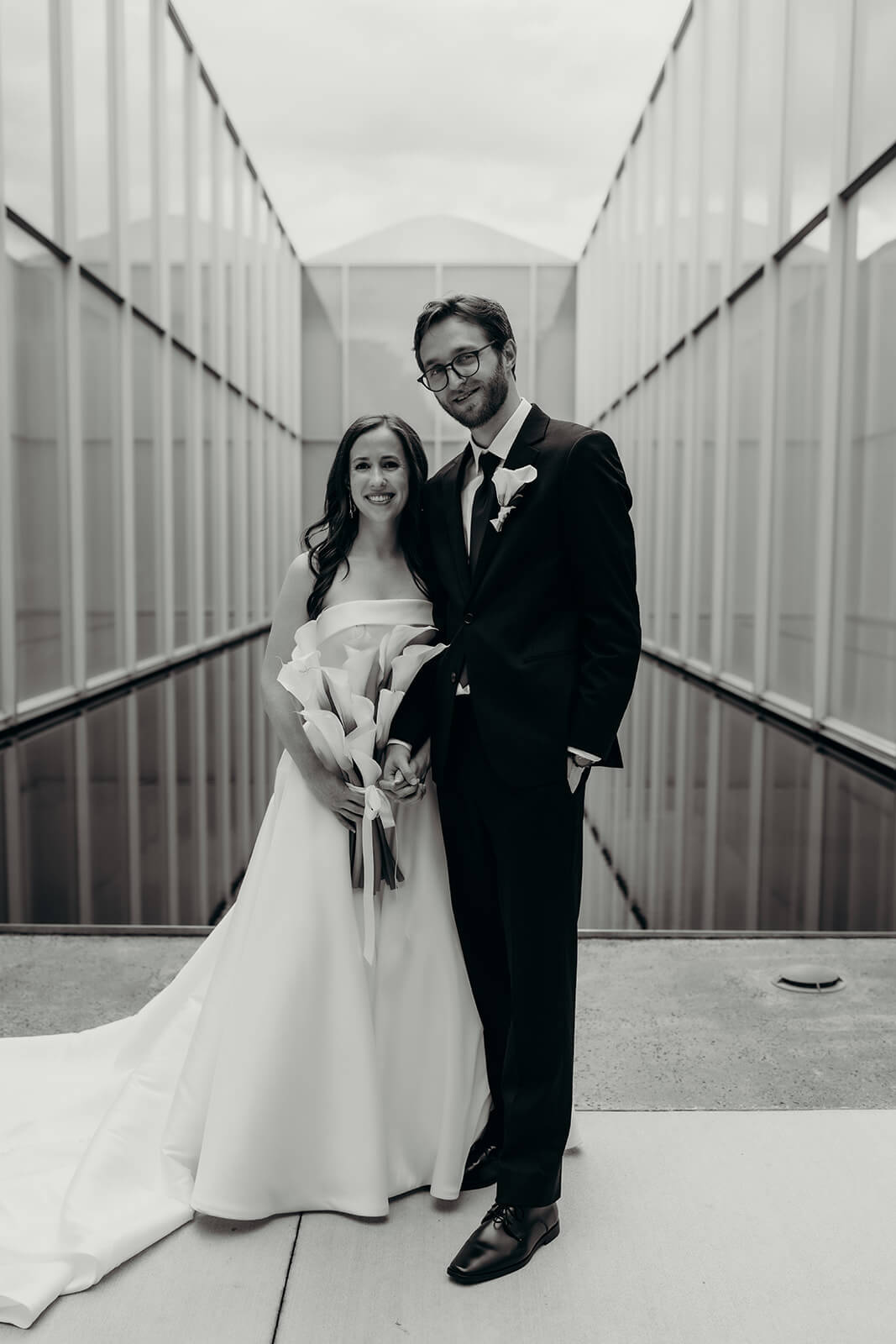 bride and groom first look moment outside of NCMA Wedding Photos